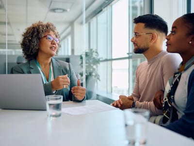 Realtor shaking hands with loan officer